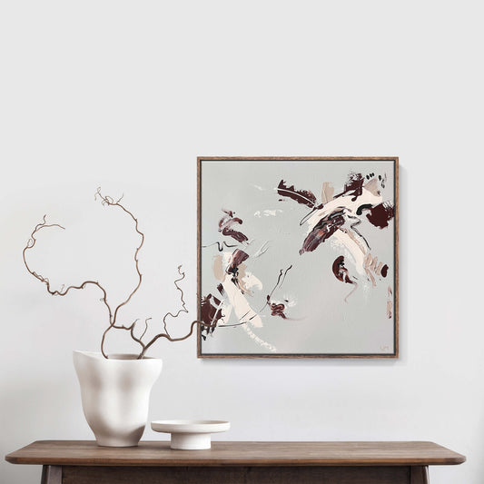 A medium natural abstract painting by Lee J Morgan Art displayed on a living room wall