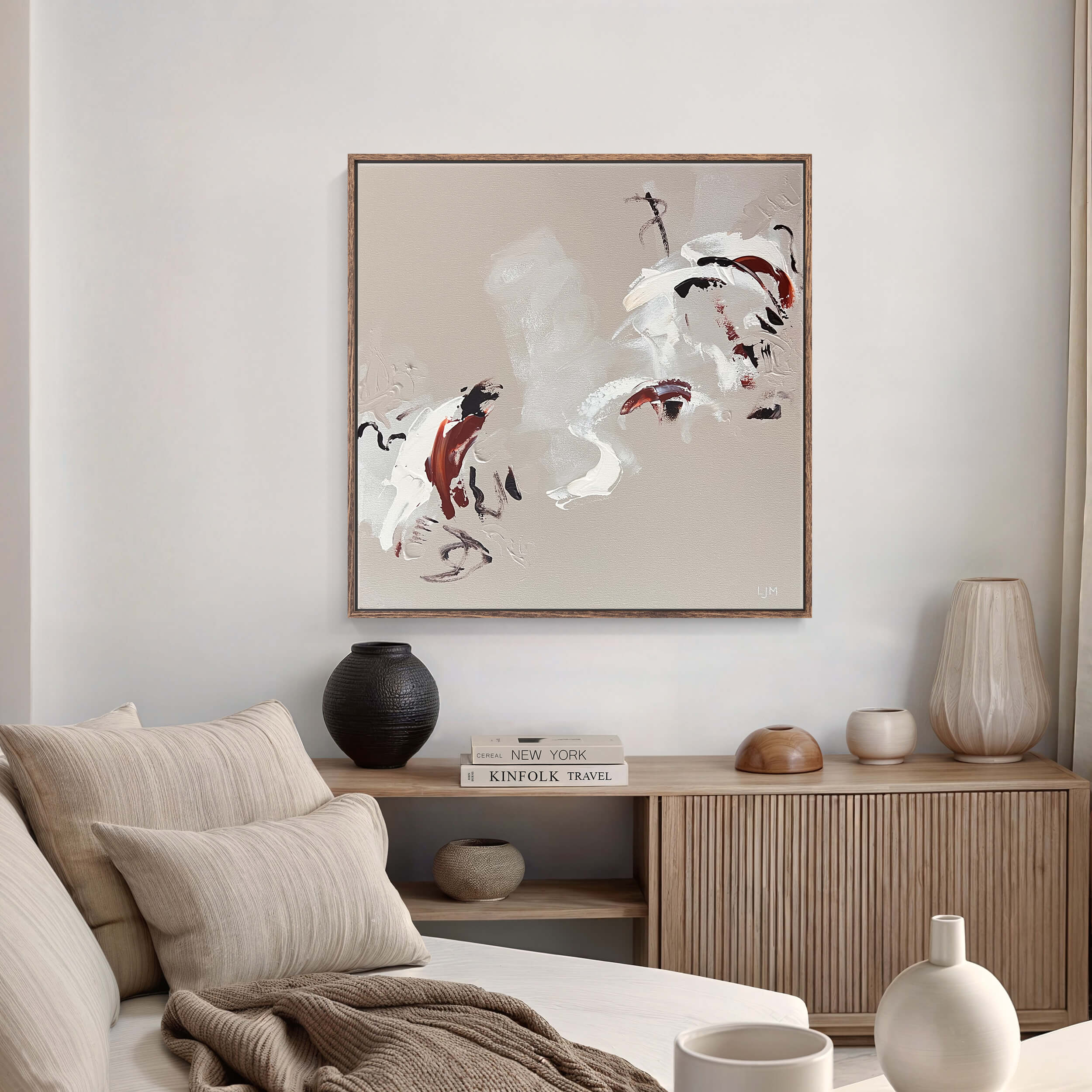 A medium beige abstract painting by Lee J Morgan Art displayed on a living room wall