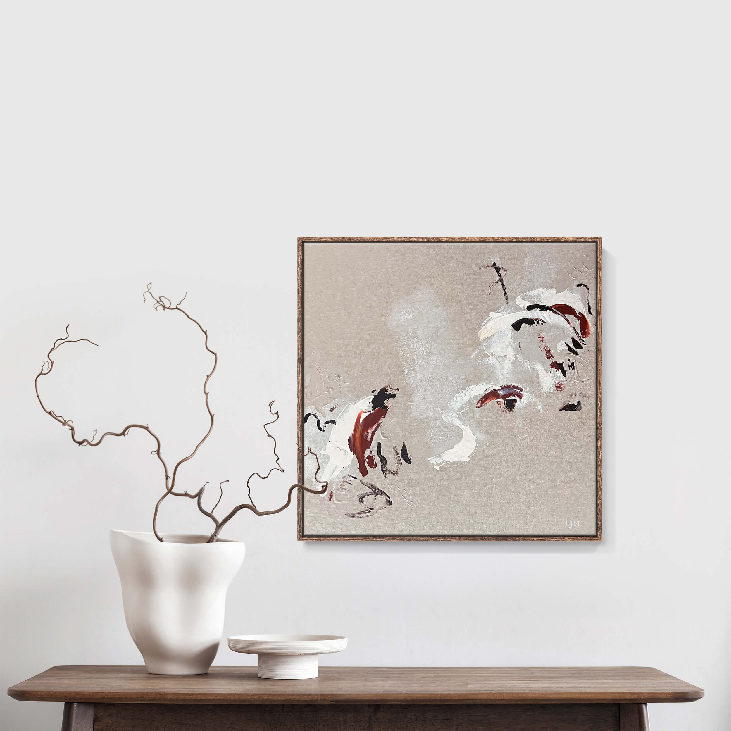 A medium beige abstract painting by Lee J Morgan Art displayed on a living room wall