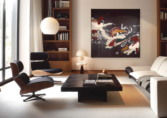 A large dark abstract painting by Lee J Morgan Art displayed on a living room wall