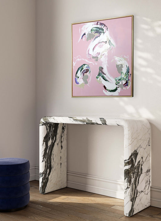 A medium pink abstract painting by Lee J Morgan Art displayed on a living room wall