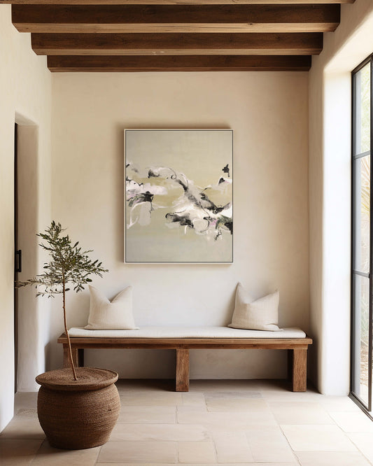 A medium neutral abstract painting by Lee J Morgan Art displayed on a living room wall