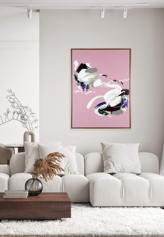 A medium pink abstract painting by Lee J Morgan Art displayed on a living room wall