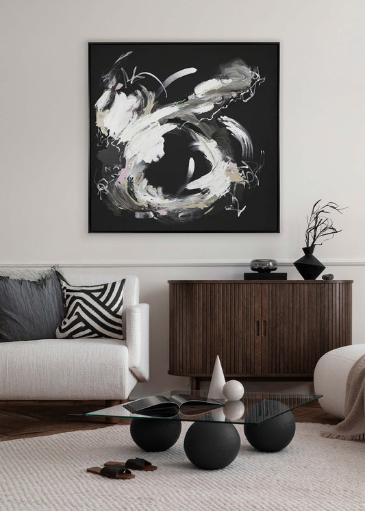 A medium, dark abstract painting by Lee J Morgan Art displayed on the living room wall