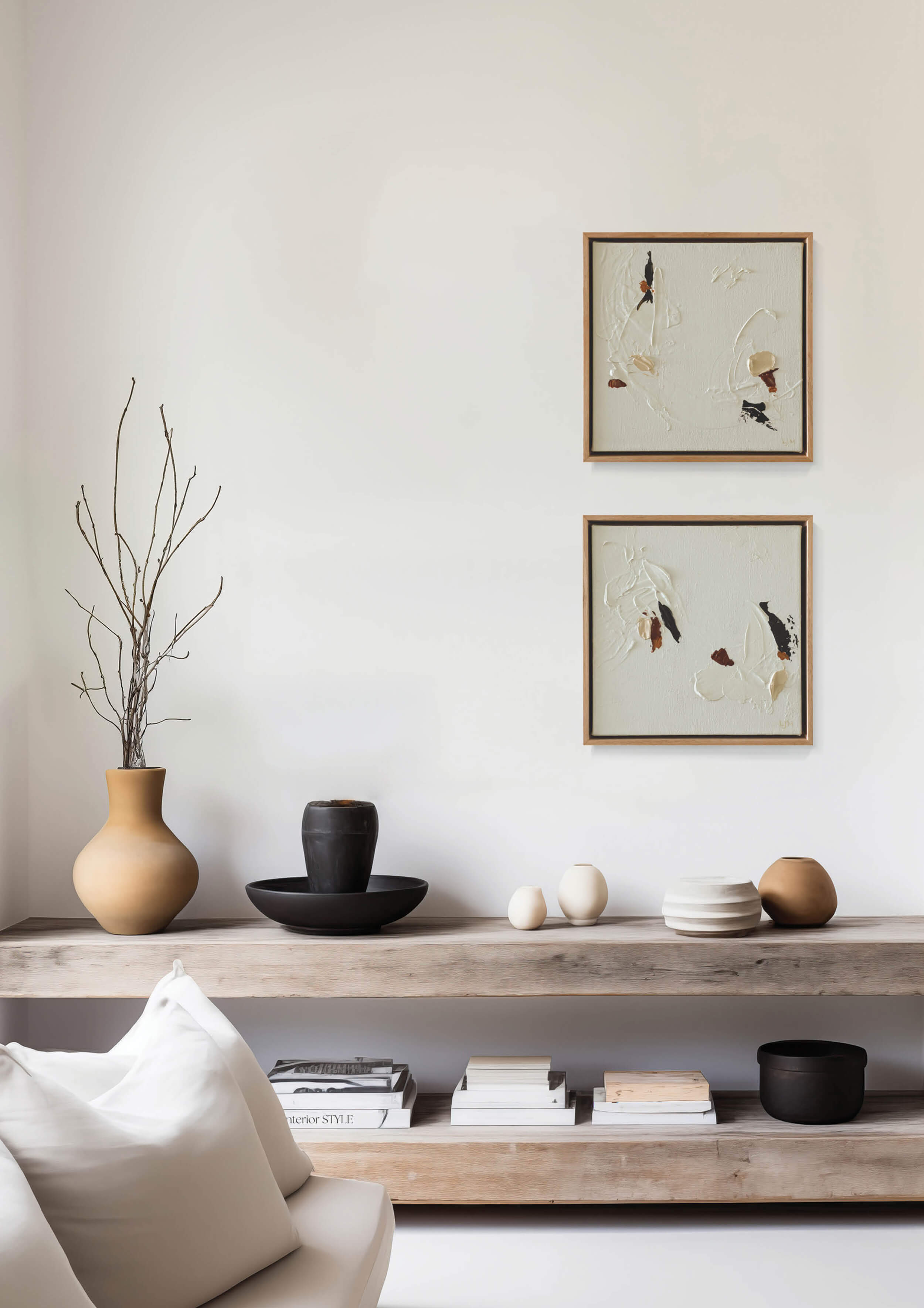 A small neutral abstract painting by Lee J Morgan Art displayed on a living room wall