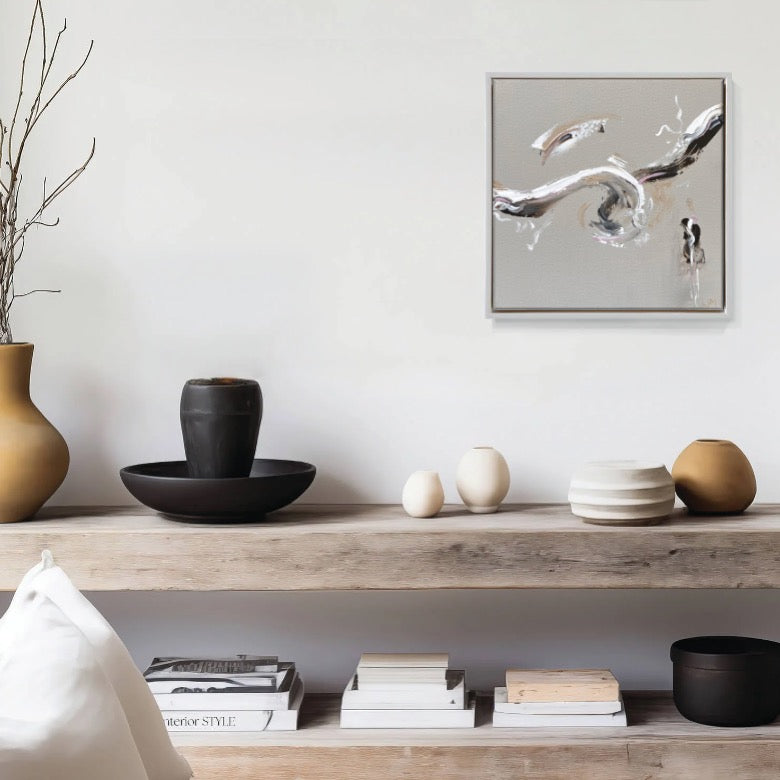 A small neutral artwork by Lee J Morgan Art displayed on a living room wall