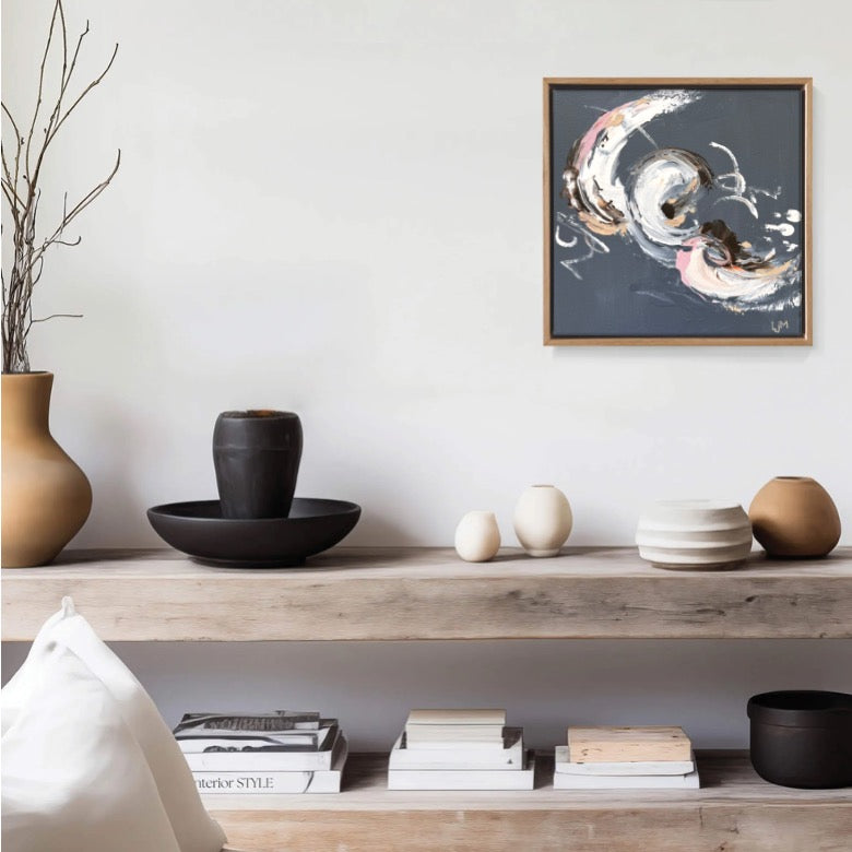 A small grey original abstract art by Lee J Morgan displayed on a living room wall