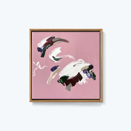 A small pink artwork by Lee J Morgan Art displayed on a living room wall