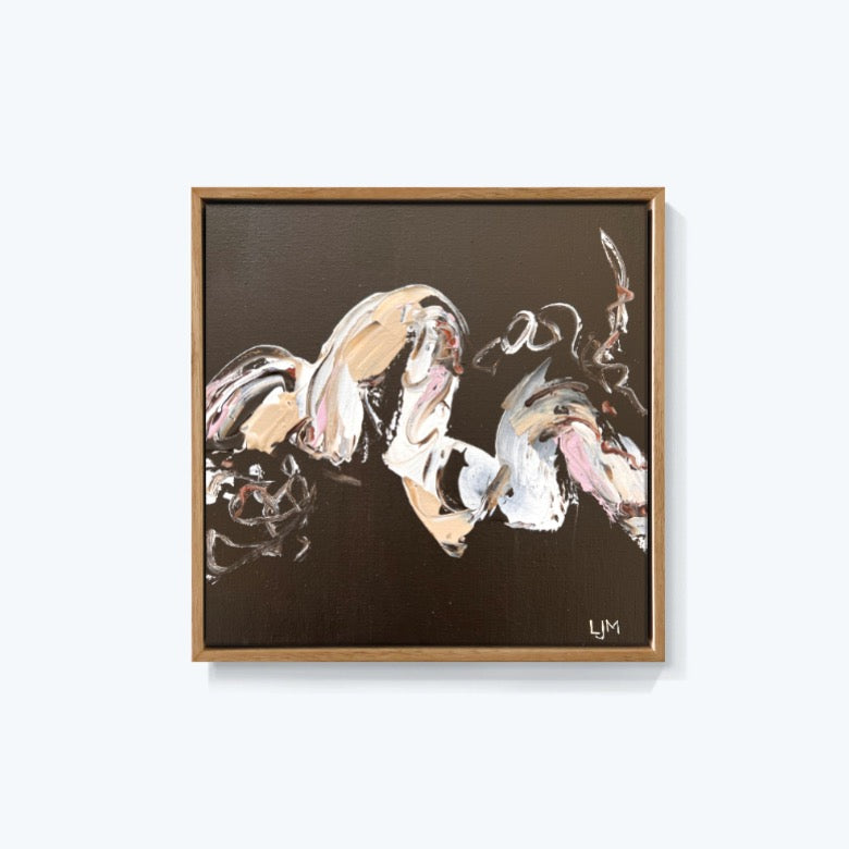 A small brown original abstract art by Lee J Morgan displayed on a living room wall